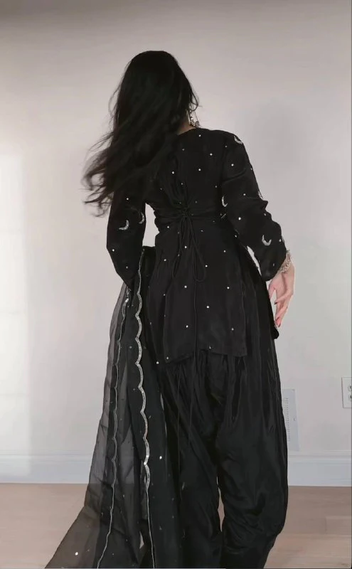 Glamorous Black Outfit with Silver Accents - Image 7