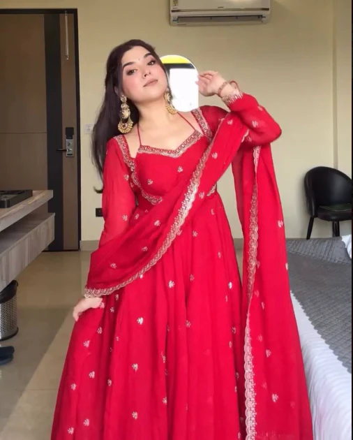 Elegance Unveiled: A Red Dress in Luxury - Image 3